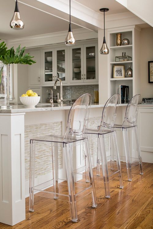 accent a bar counter with beautiful clear acrylic chairs for a modern touch