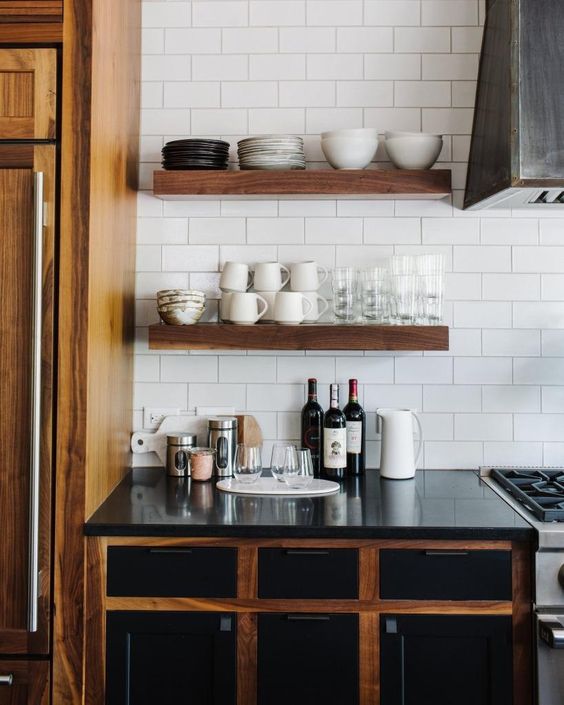 just a couple of thick rich-stained wooden shelves that match the wood of the cabinets for a cohesive look