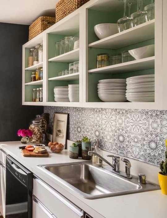 a stylish modern kitchen with practical upper cabinets