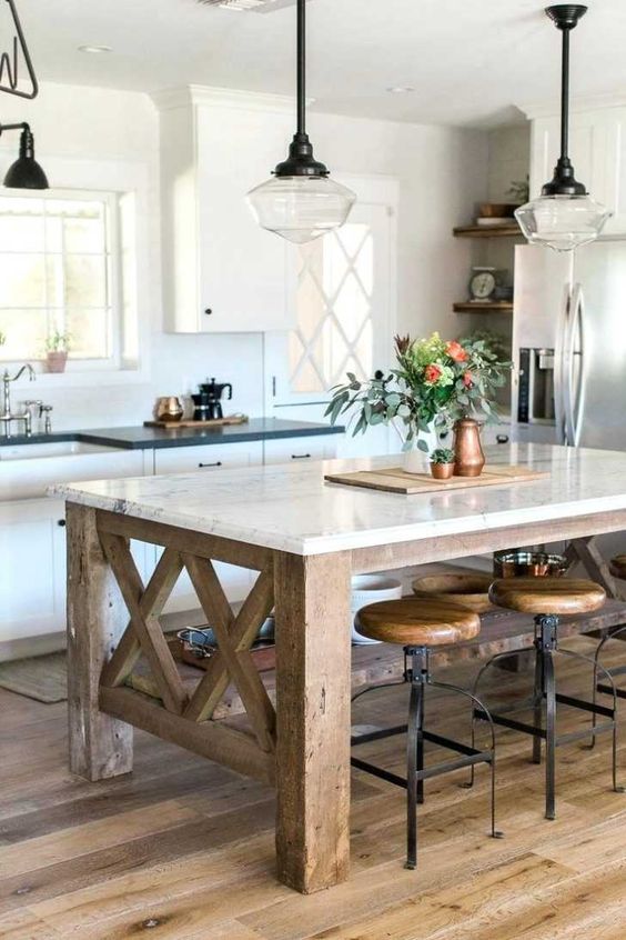 19-a-farmhouse-kitchen-with-a-rustic-kitchen-island-of-wood-and-a-stone-countertop-to-use-as-a-dining-table.jpg