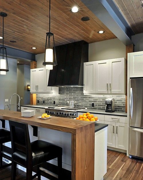 a two tier kitchen counter is ideal to fit in every decorating space: the kitchen and the living room around