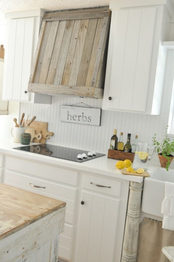 Building a cover for your modern range hood out of scrap wood would work perfectly for a farmhouse kitchen décor.