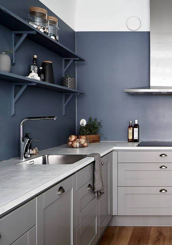 a bold contemporary kitchen in light grey with_yyth