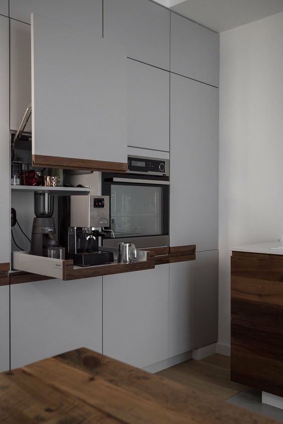 a cabinet with a lifting up door and retract