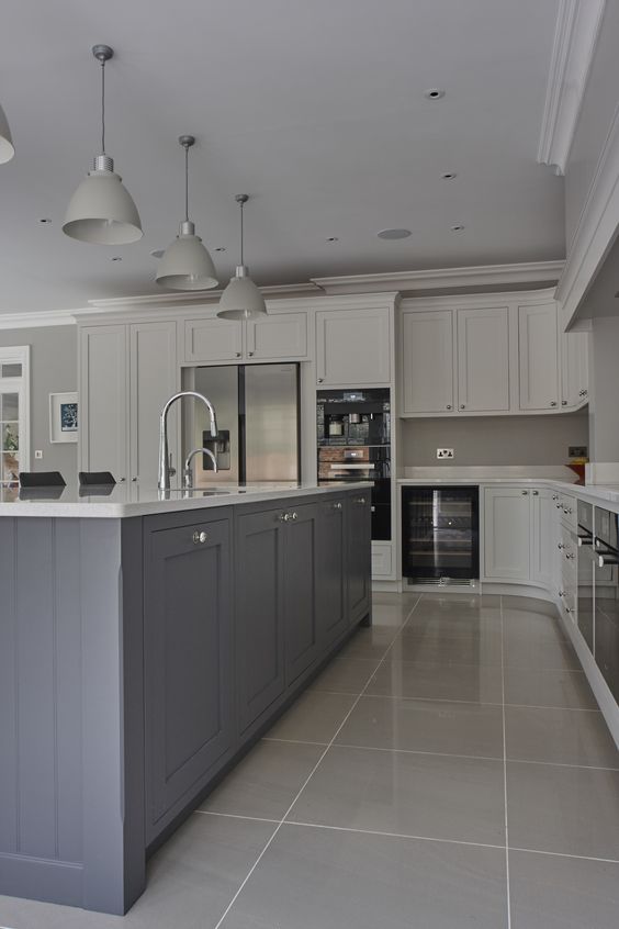 a chic kitchen with dove grey cabinets_ a pa