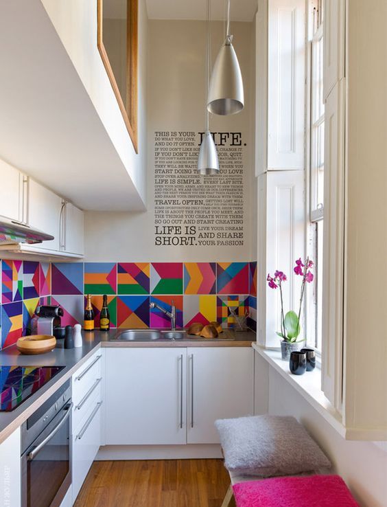 a colorful tile backsplash changes the space and_yy