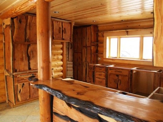a full wooden kitchen with a matching wooden_yythkg