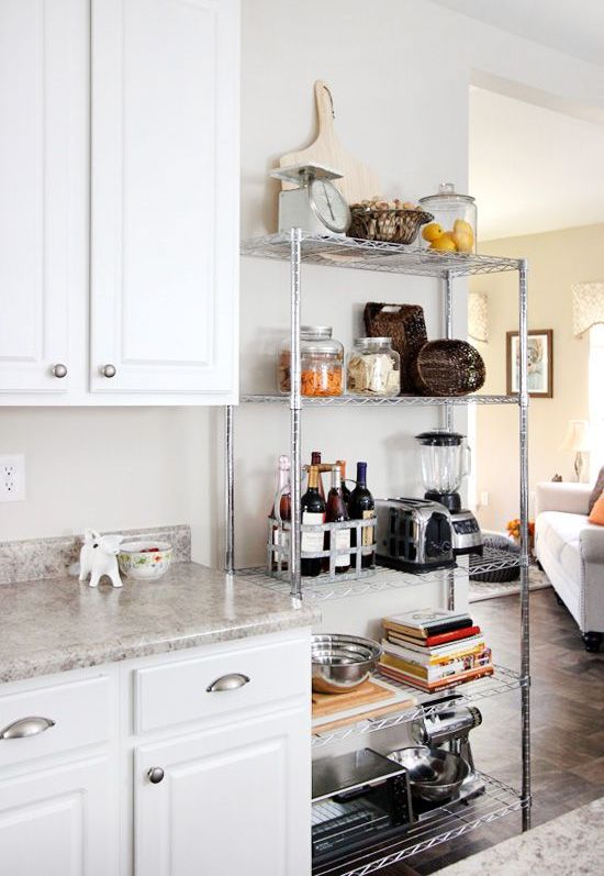 a lightweight metal shelving unit next to your_yyth