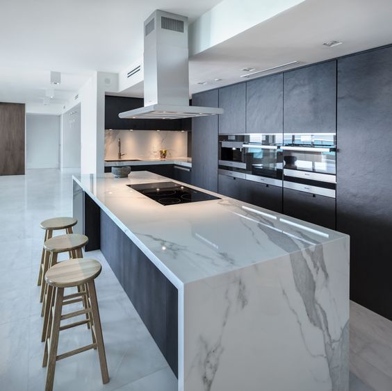 a minimalist dark kitchen with a gorgeous large_yyt