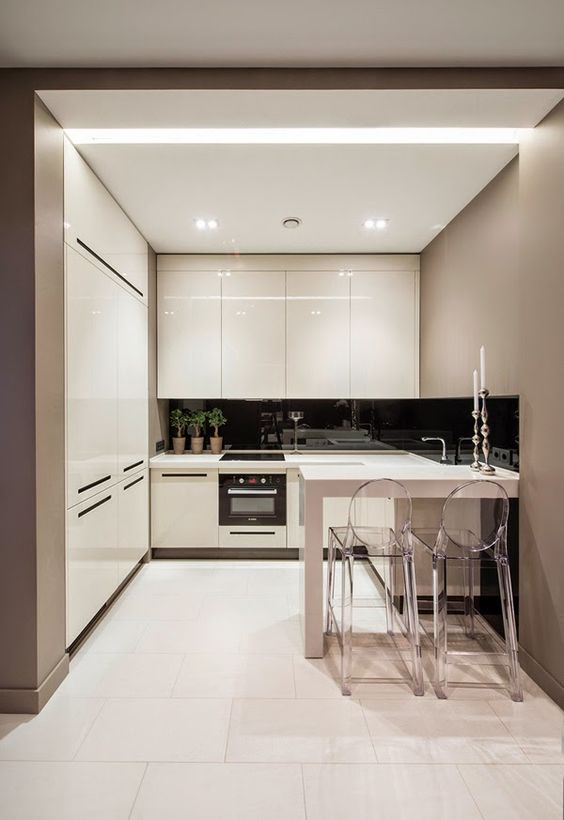 built-in lights and glossy cabinets that reflect th