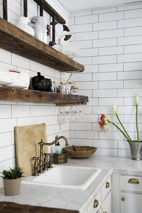 dark reclaimed wooden shelves look very bold and_yy