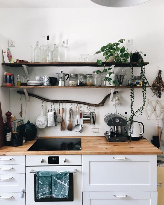 thin dark shelves of reclaimed wood is a nic