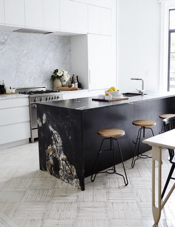 a modern white kitchen and a black kitchen i